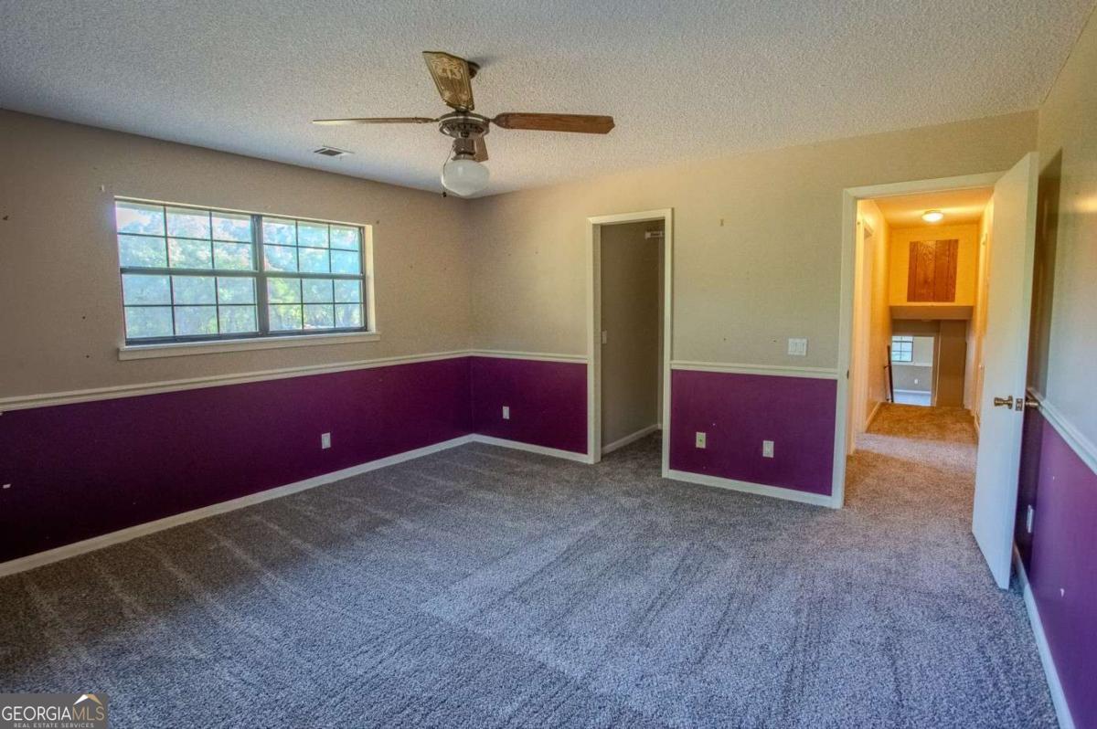 528 Gardner Road Baxley, GA 31513 - Photo 37 of 39 a view of wooden floor and windows in a room