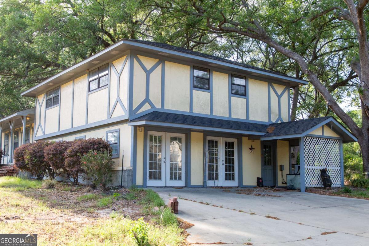528 Gardner Road Baxley, GA 31513 - Photo 5 of 39 a front view of a house with a porch