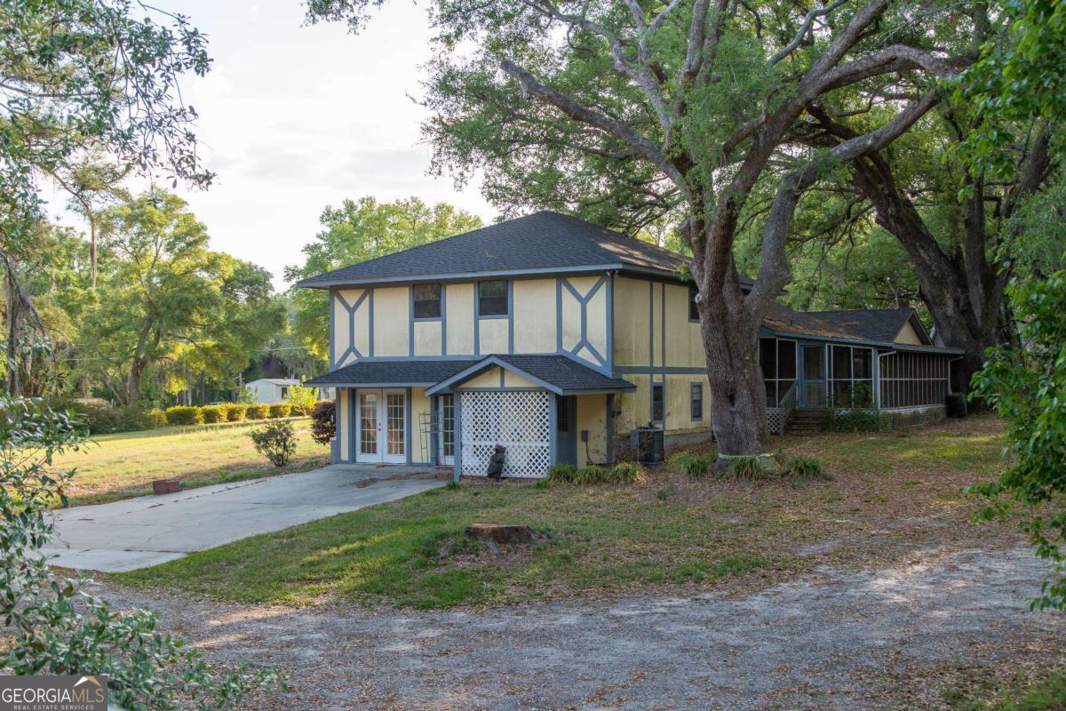 528 Gardner Road Baxley, GA 31513 - Photo 6 of 39 a view of a yard in front of house