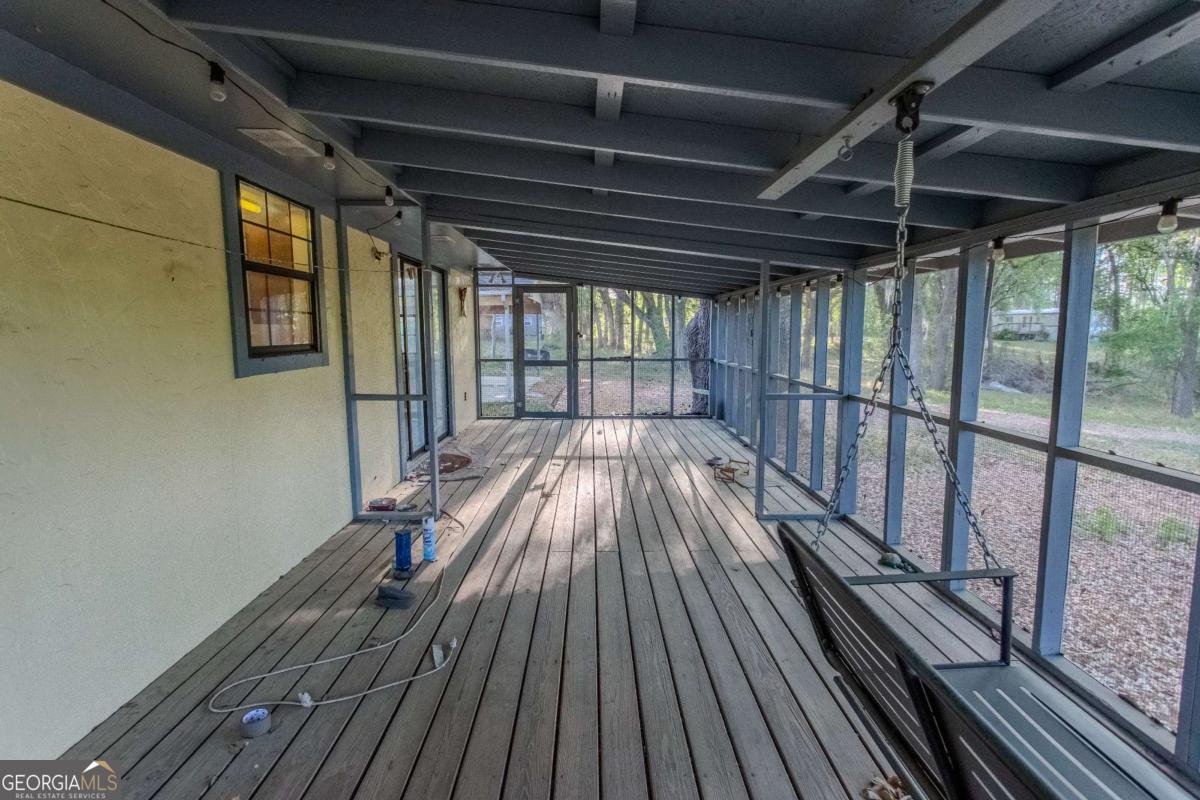528 Gardner Road Baxley, GA 31513 - Photo 9 of 39 a view of a balcony with wooden floor