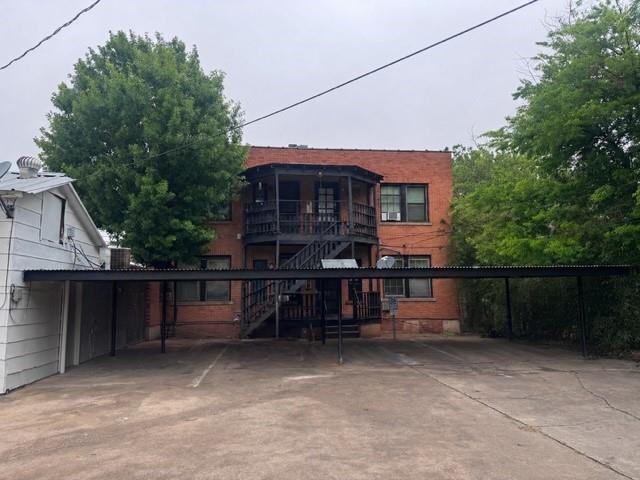 1821 9th Street, Unit B Wichita Falls, TX 76301 - Photo 14 of 14 a view of house with outdoor seating area