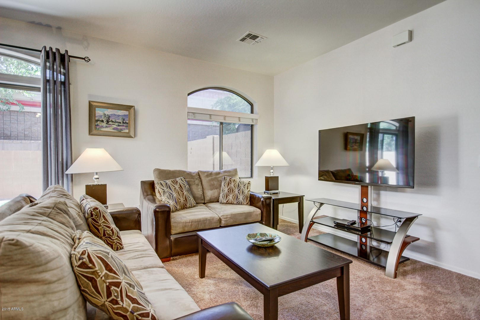 2150 East Bell Road, Unit 1060 Phoenix, AZ 85022 - Photo 7 of 25 a living room with furniture