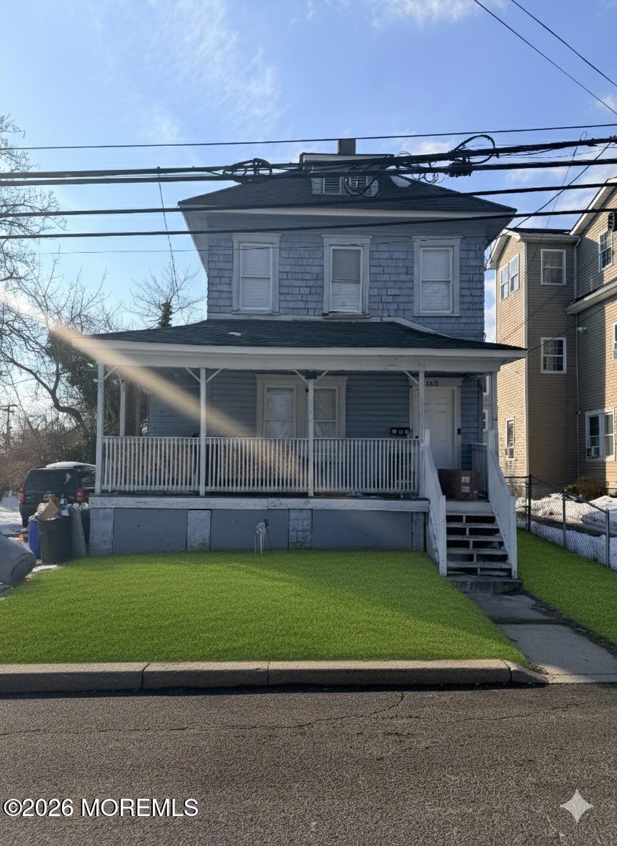 101-103 Ridge Avenue Asbury Park, NJ 07712 - Photo 2 of 11 a view of a house with a backyard