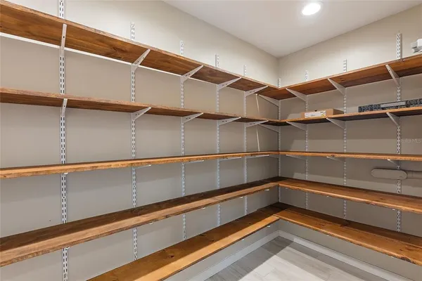 a view of a room with racks on the wall