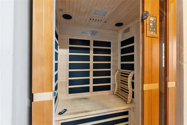 a view of walk in closet and stairs