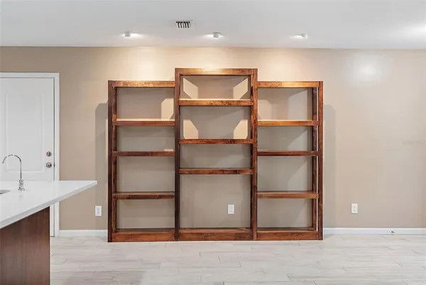 a view of a room with shelves