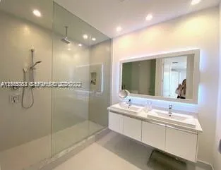 a bathroom with a toilet and a sink