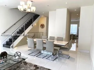 a work room with furniture and wooden floor