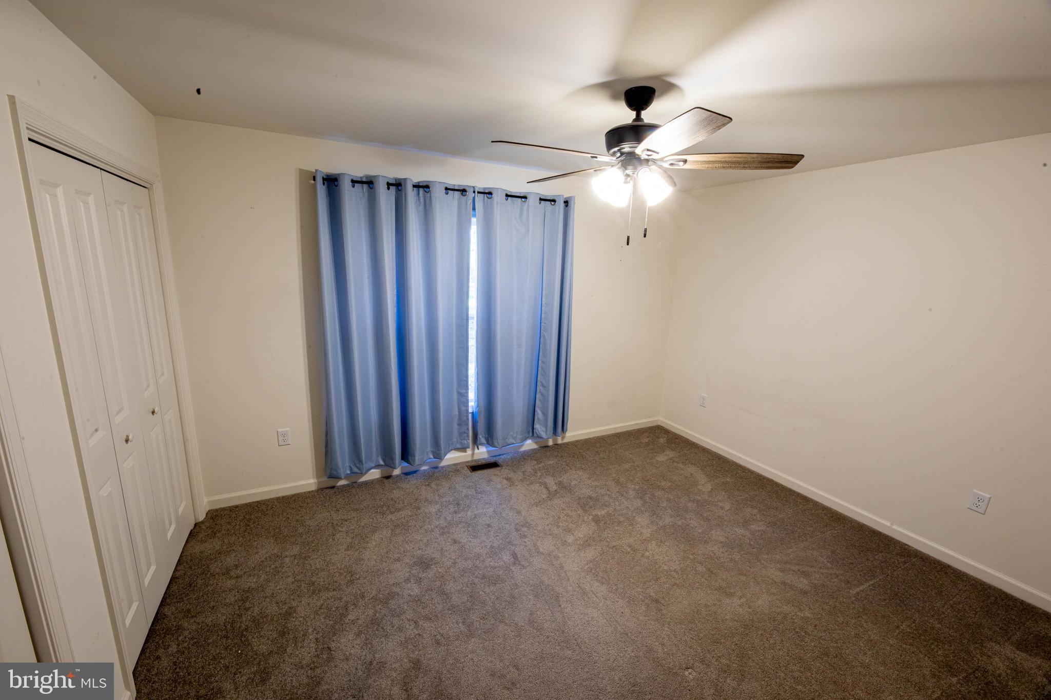 26300 Fire Tower Road Seaford, DE 19973 - Photo 34 of 52 a view of an empty room and a ceiling fan