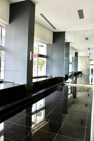 a view of an empty room and window