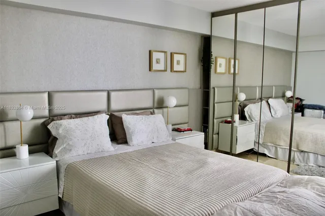 a bedroom with a bed and closet