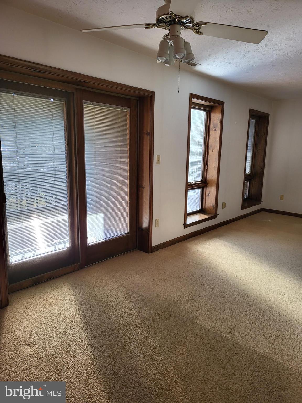 44788 Locust Ridge Court, Unit 8A California, MD 20619 - Photo 4 of 24 living room to slider