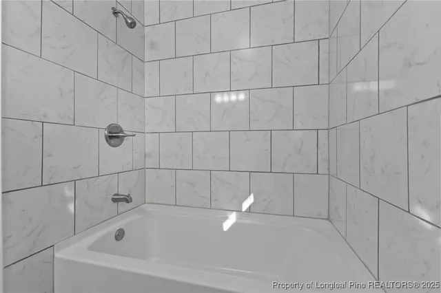 a bathroom with a bathtub