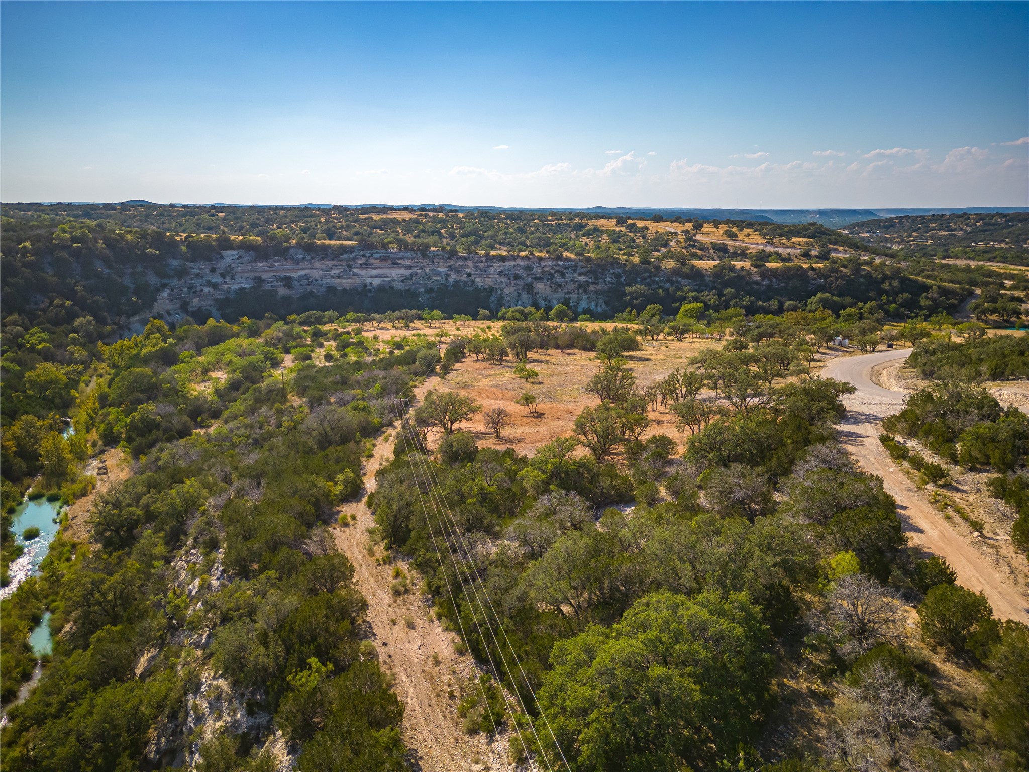 Lot 20 Seven Spring Dr Junction, Unit LOT 20 Junction, TX 76849 - Photo 31 of 40 an aerial view of residential building and ocean