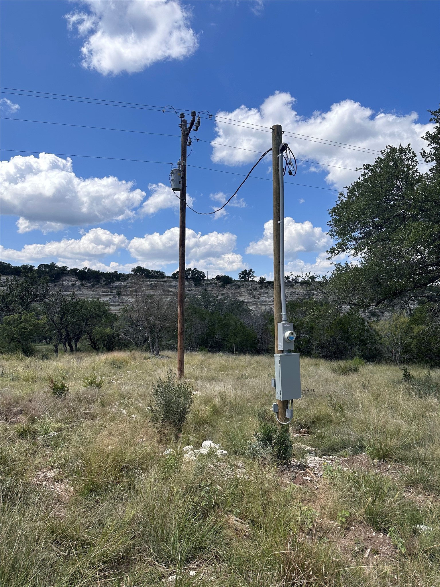 Lot 20 Seven Spring Dr Junction, Unit LOT 20 Junction, TX 76849 - Photo 33 of 40 a view of a road with a light pole and a palm tree park