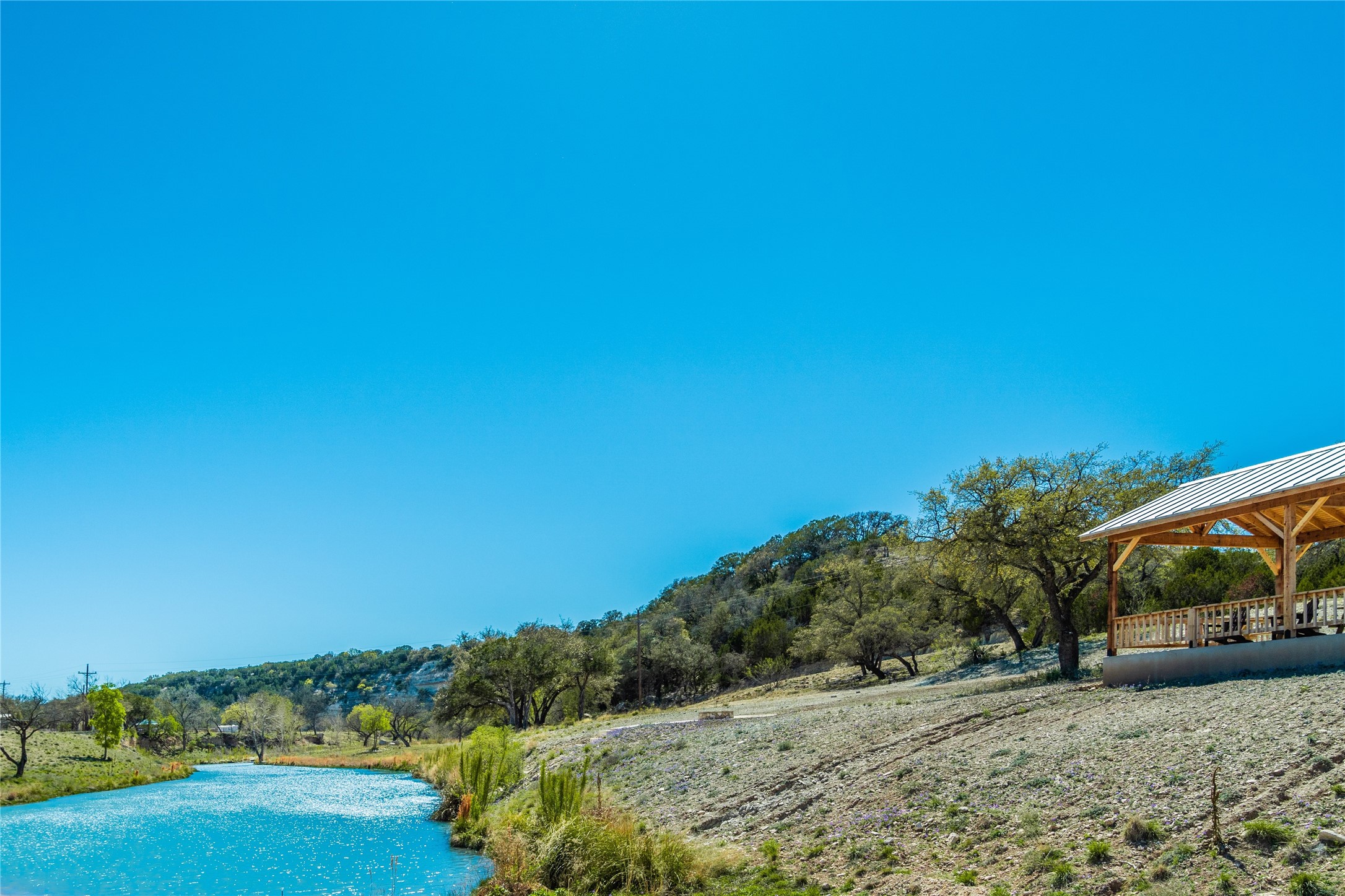 Lot 20 Seven Spring Dr Junction, Unit LOT 20 Junction, TX 76849 - Photo 36 of 40 a view of a road with an ocean view