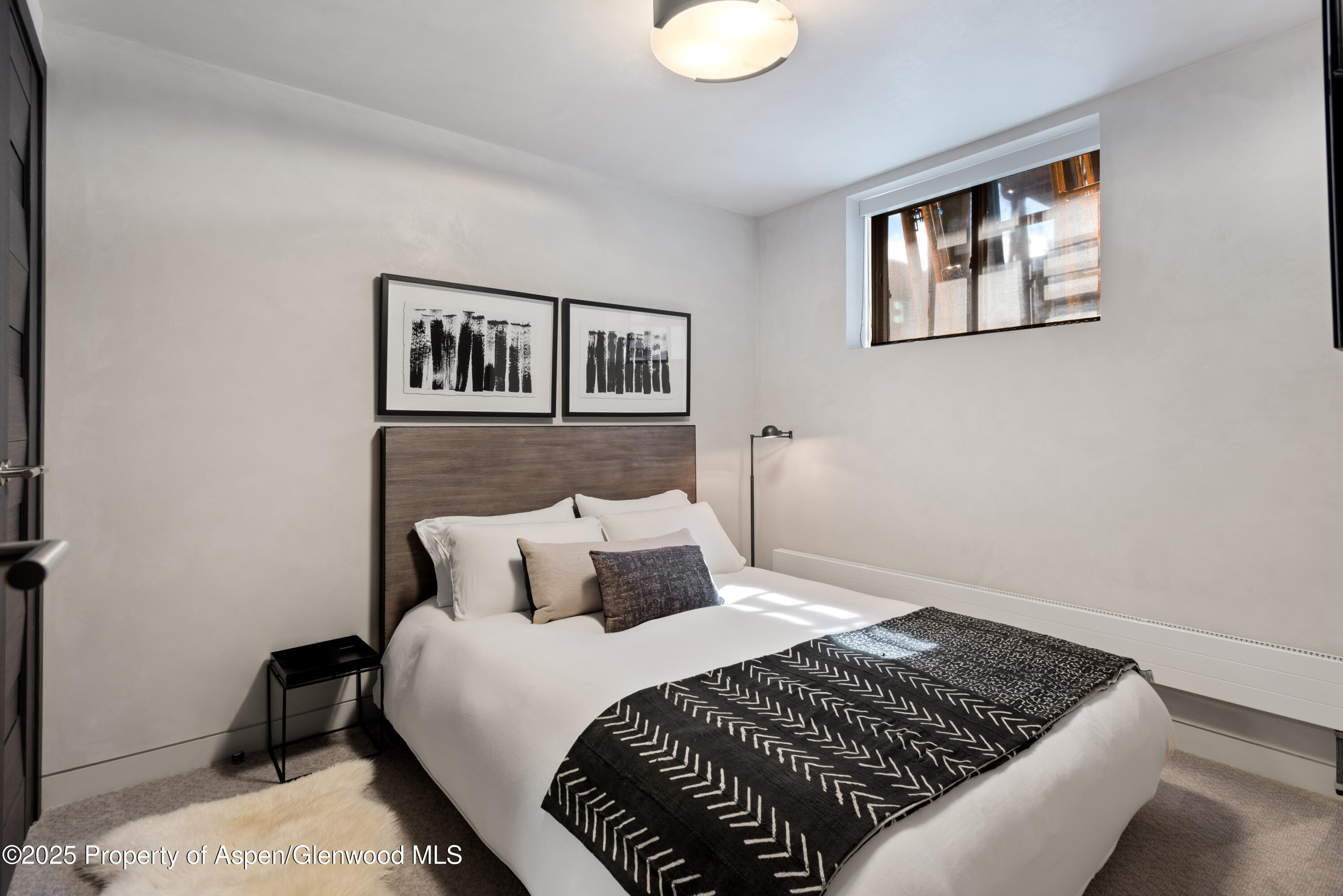 124 East Durant Avenue, Unit 7 Aspen, CO 81611 - Photo 14 of 19 Guest Bedroom