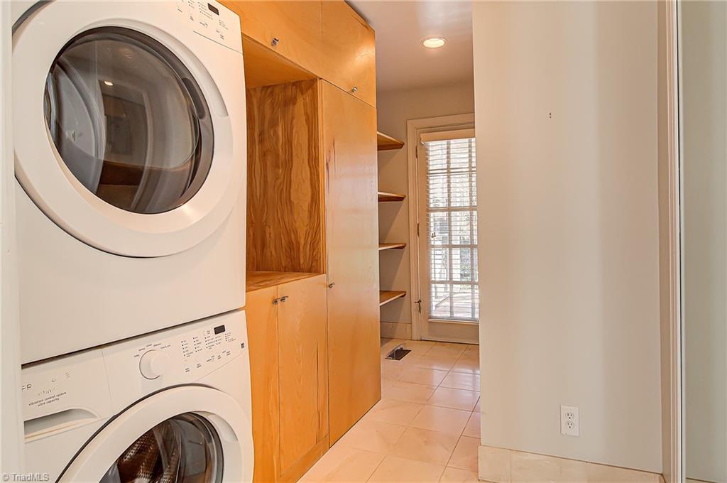 540 Arbor Road Winston-Salem, NC 27104 - Photo 19 of 30 Laundry area with heated tiled floors and door access to the screened porch.