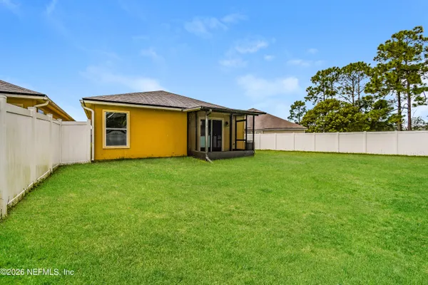 a view of backyard with garden