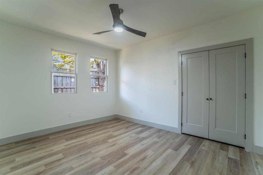5914 Victor Street Dallas, TX 75214 - Photo 22 of 32 a view of empty room with wooden floor