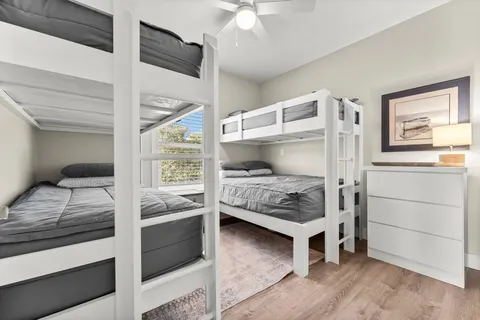 a bedroom with a bed and a sink