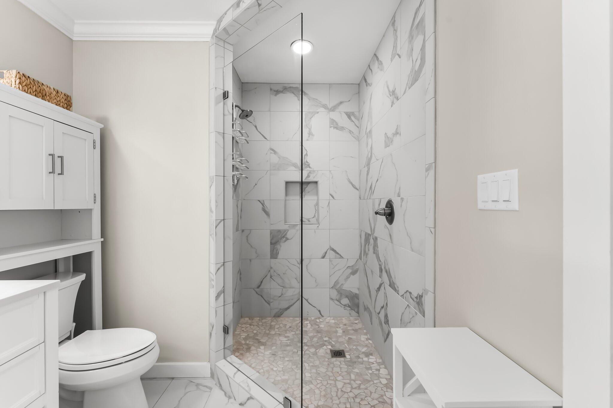 6126 West County Highway 30A Santa Rosa Beach, FL 32459 - Photo 31 of 76 a bathroom with a shower and toilet