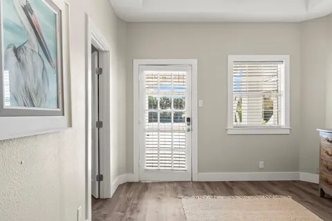 a view of a swimming pool with a yard