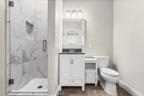 a view of a brick building next to a brick building