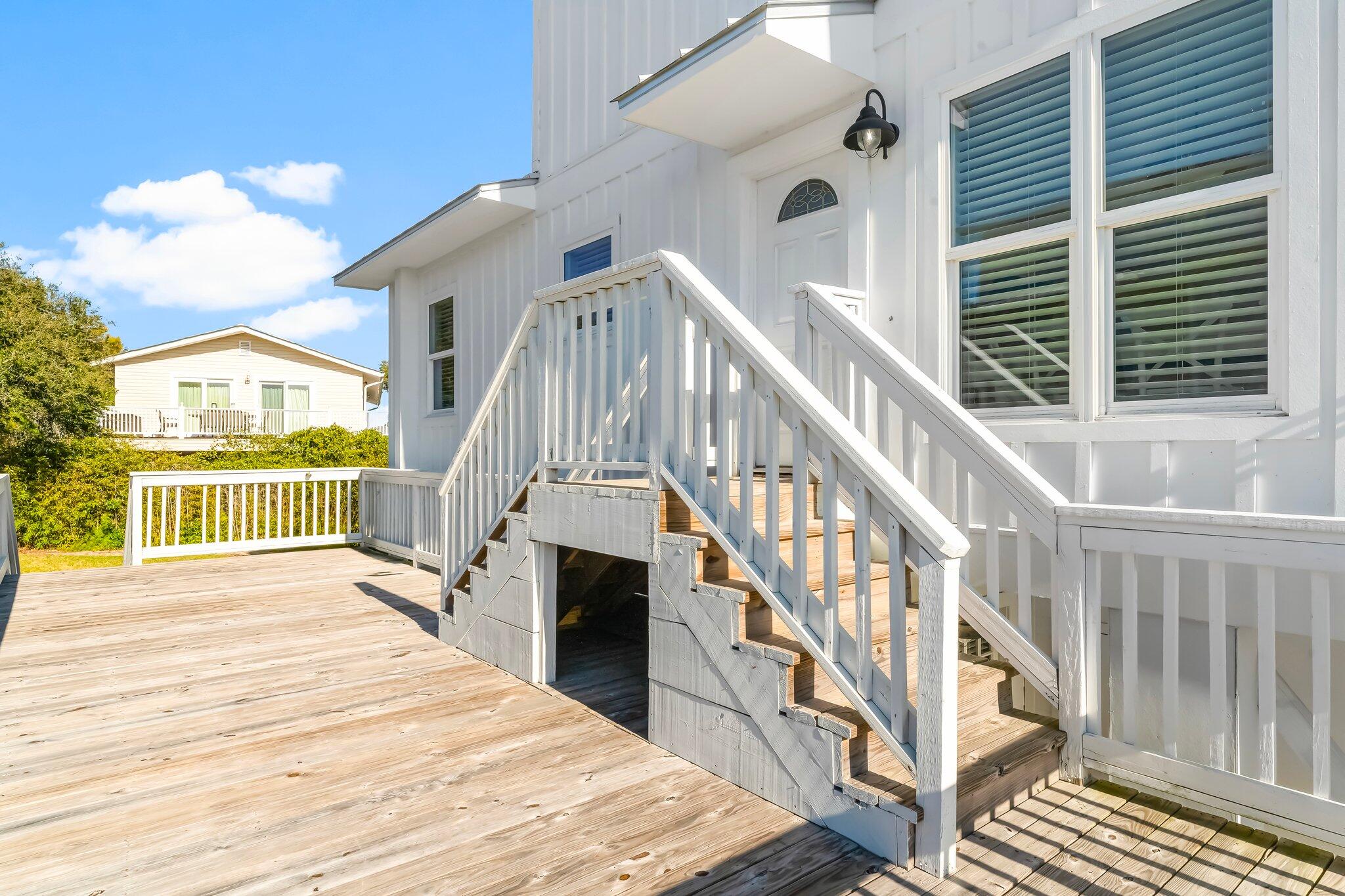 6126 West County Highway 30A Santa Rosa Beach, FL 32459 - Photo 47 of 76 a view of entryway and hall with wooden floor