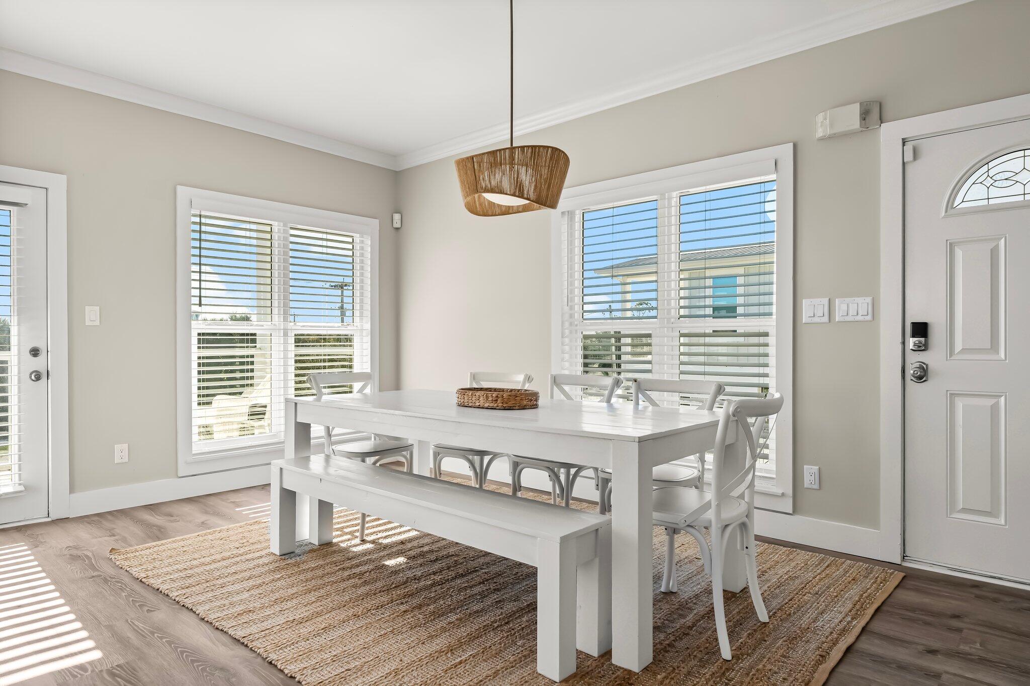 6126 West County Highway 30A Santa Rosa Beach, FL 32459 - Photo 8 of 76 a living room with dining table and a window
