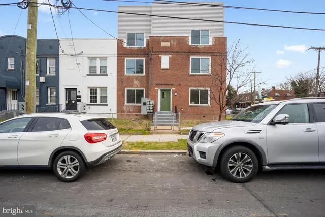 a car parked in front of a house