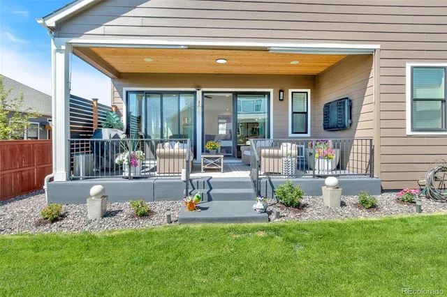 a front view of a house with patio