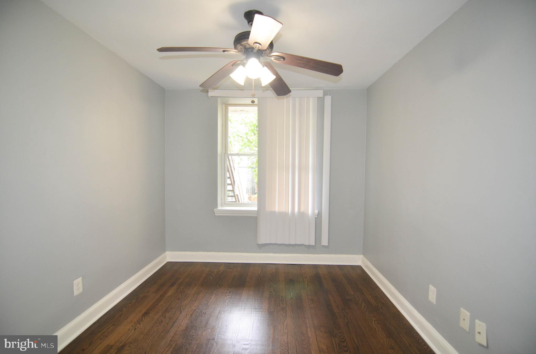 39 Galveston Place Southwest Washington, DC 20032 - Photo 15 of 21 a view of wooden floor and windows in a room