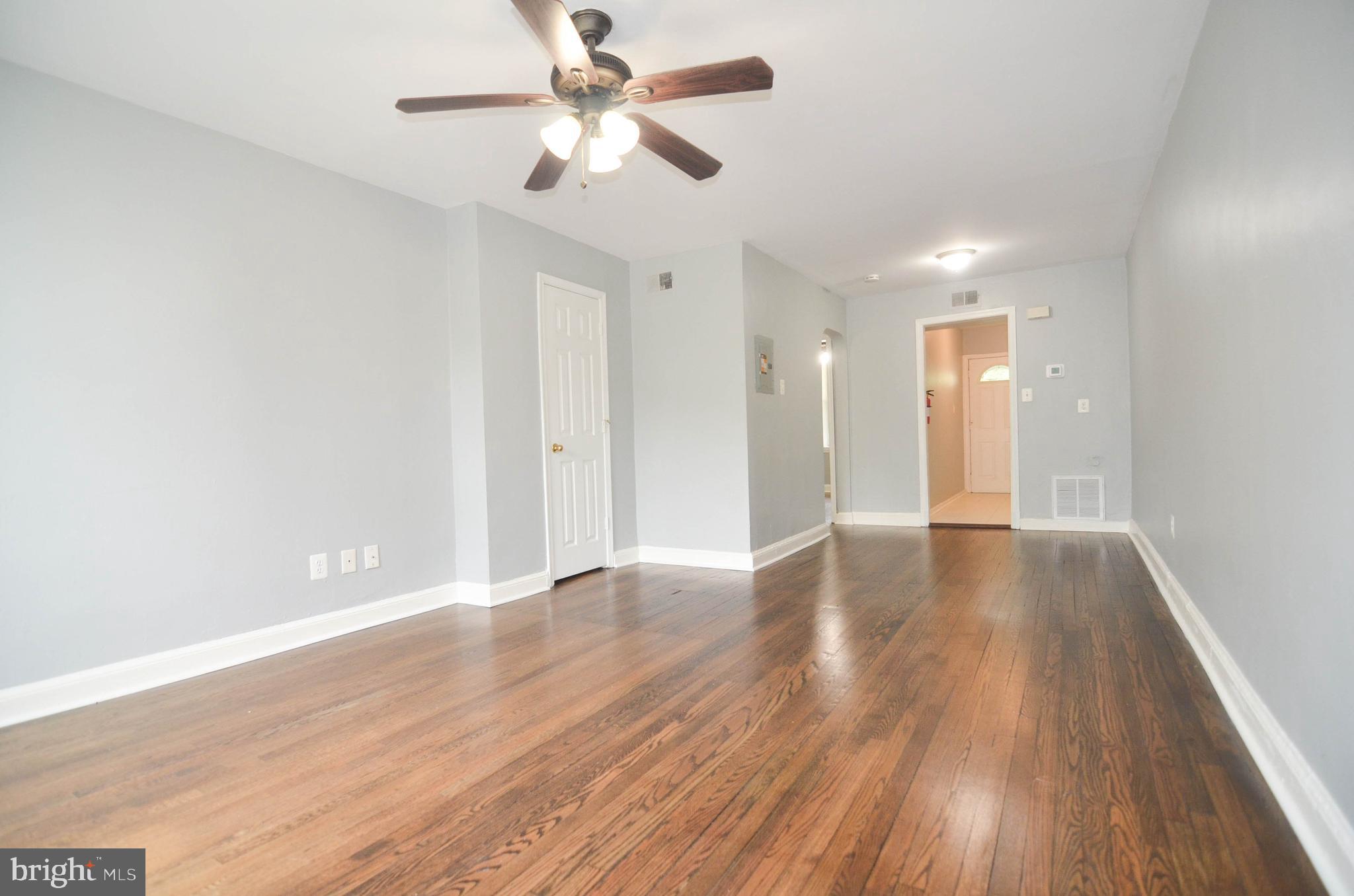 39 Galveston Place Southwest Washington, DC 20032 - Photo 20 of 21 a view of an empty room with wooden floor
