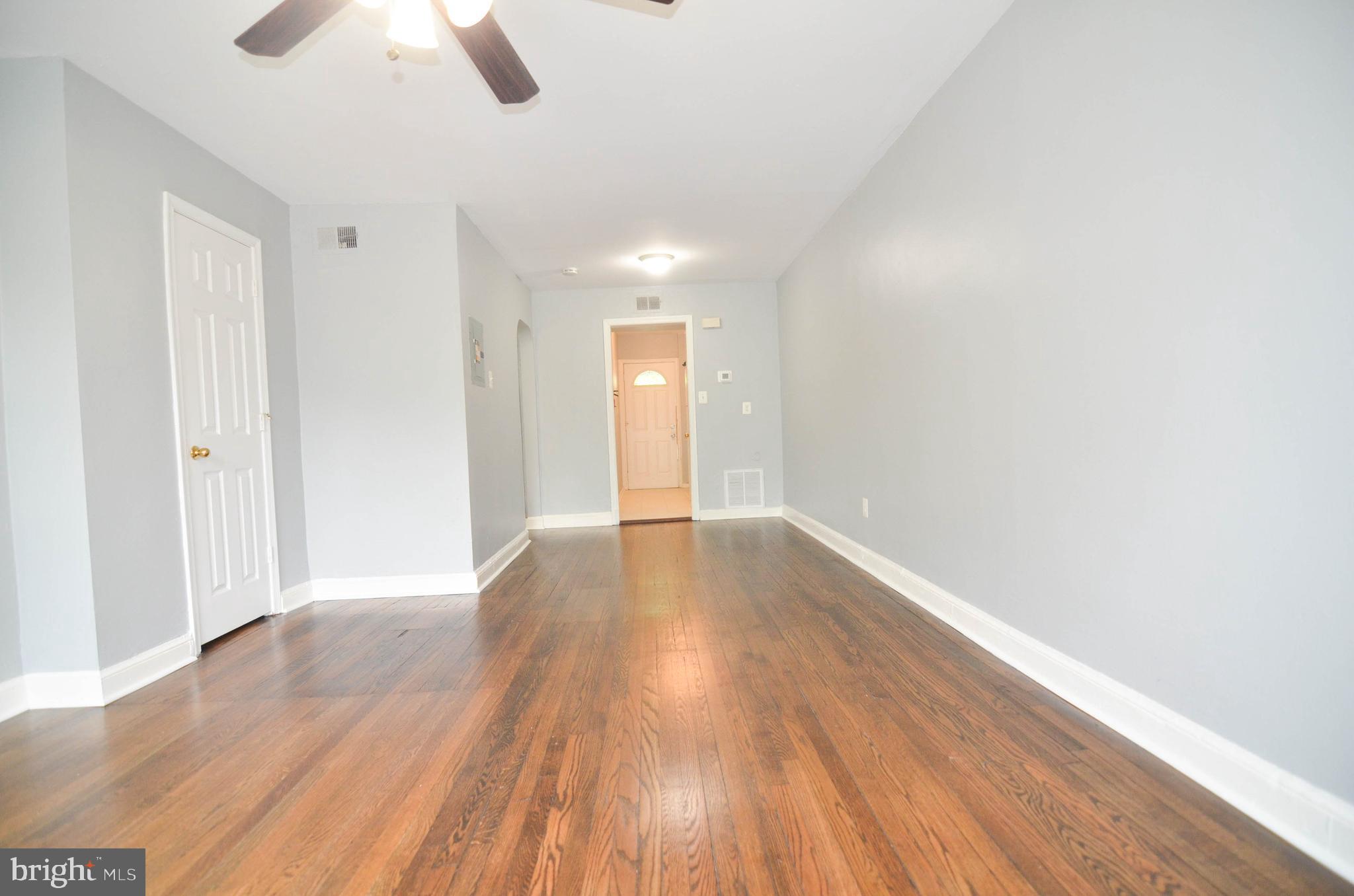 39 Galveston Place Southwest Washington, DC 20032 - Photo 21 of 21 a view of an empty room with wooden floor