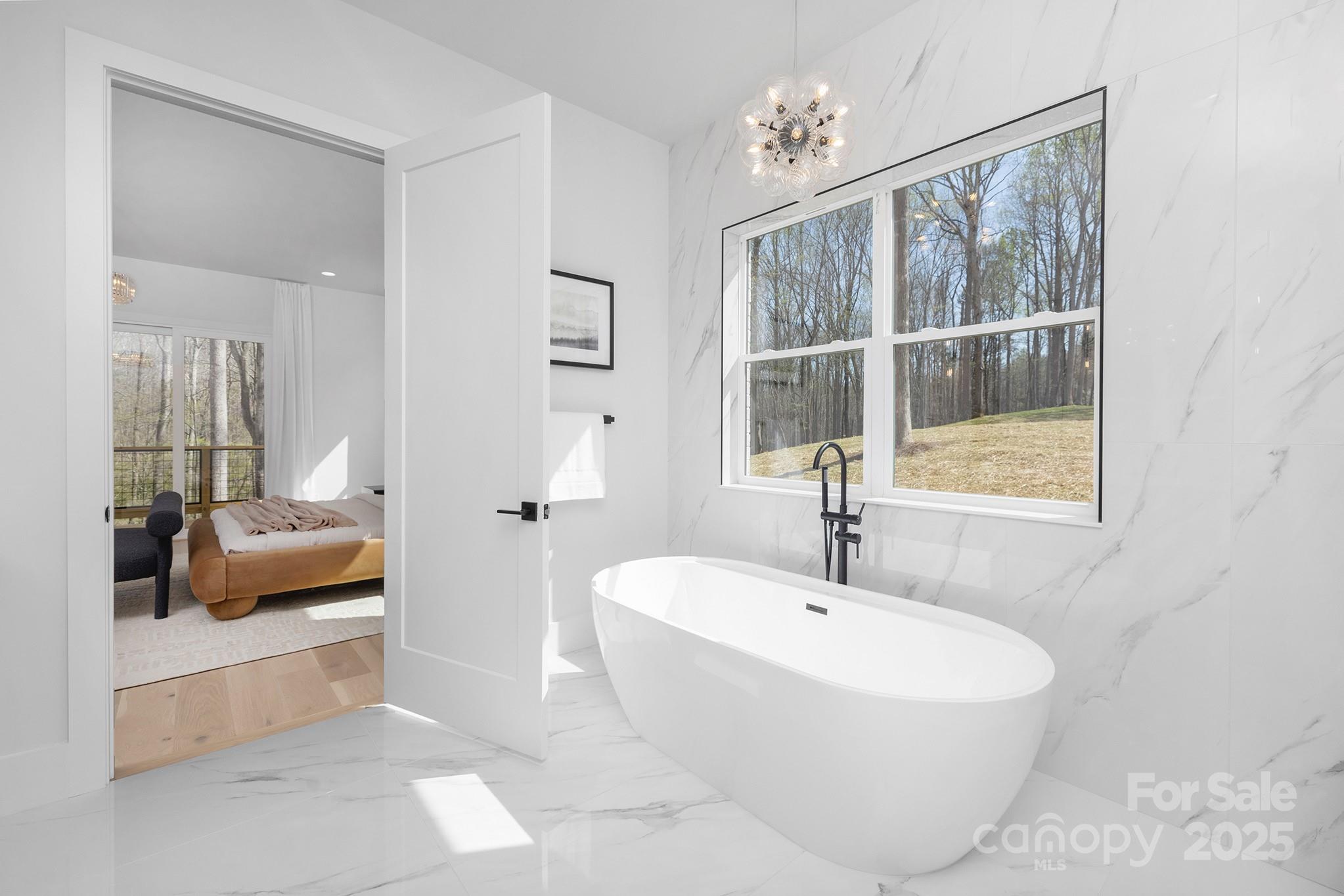 12011 Brief Road Charlotte, NC 28227 - Photo 12 of 12 a bathroom with a sink and a large mirror