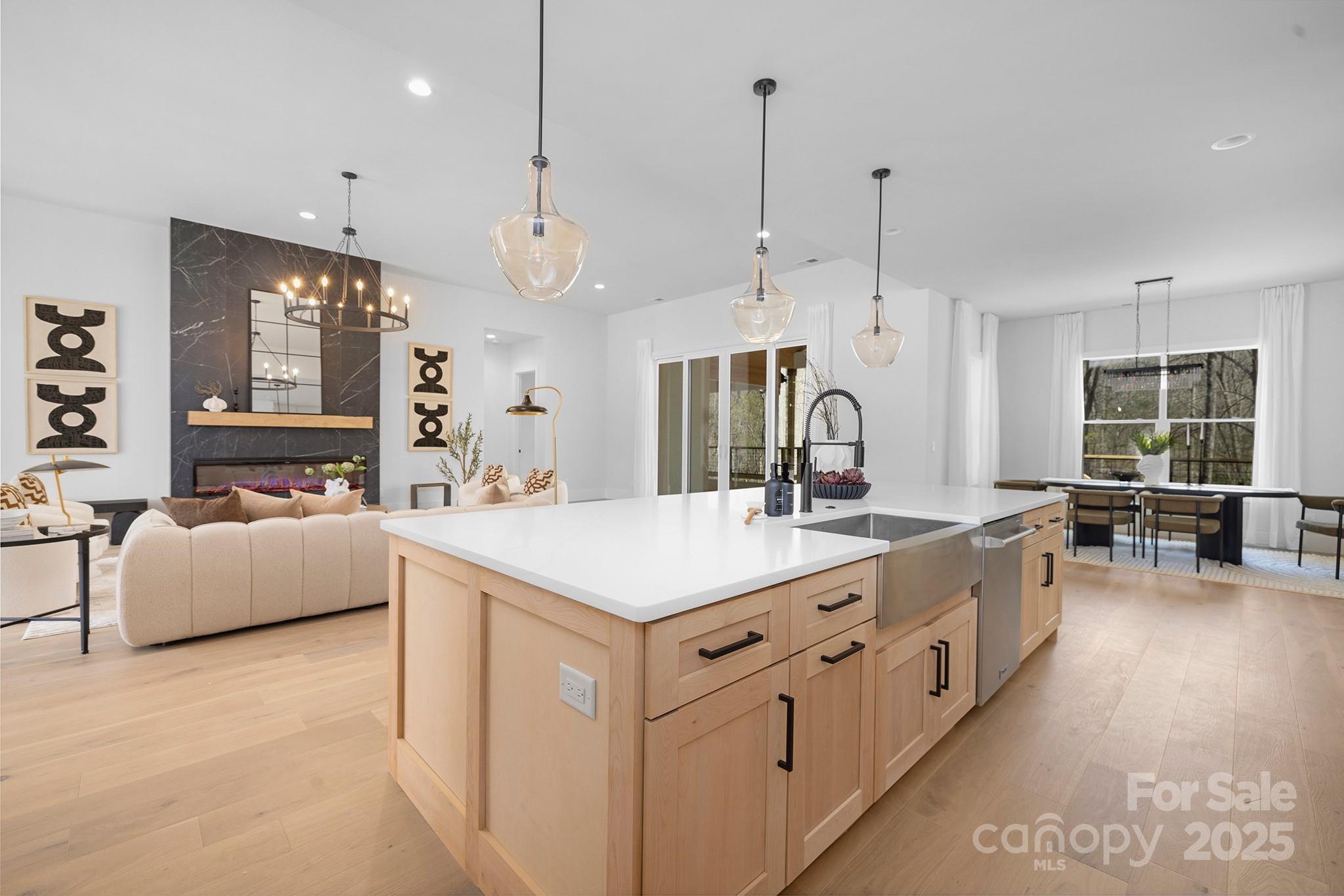 12011 Brief Road Charlotte, NC 28227 - Photo 4 of 12 a large white kitchen with a large window