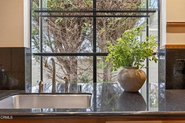 a kitchen with a stove and a microwave