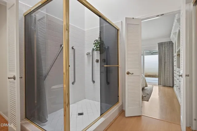 a bathroom with a double vanity sink and mirror