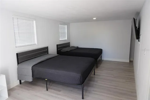 a room with a bed and a window