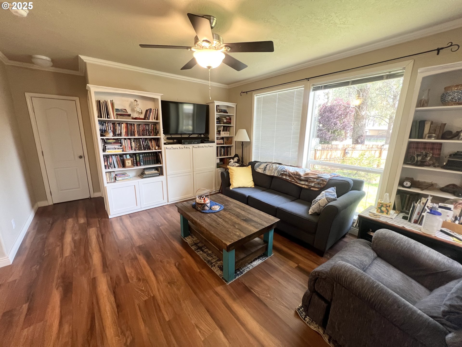 1809 26th Street, Unit 12 La Grande, OR 97850 - Photo 6 of 16 a living room with furniture and a flat screen tv