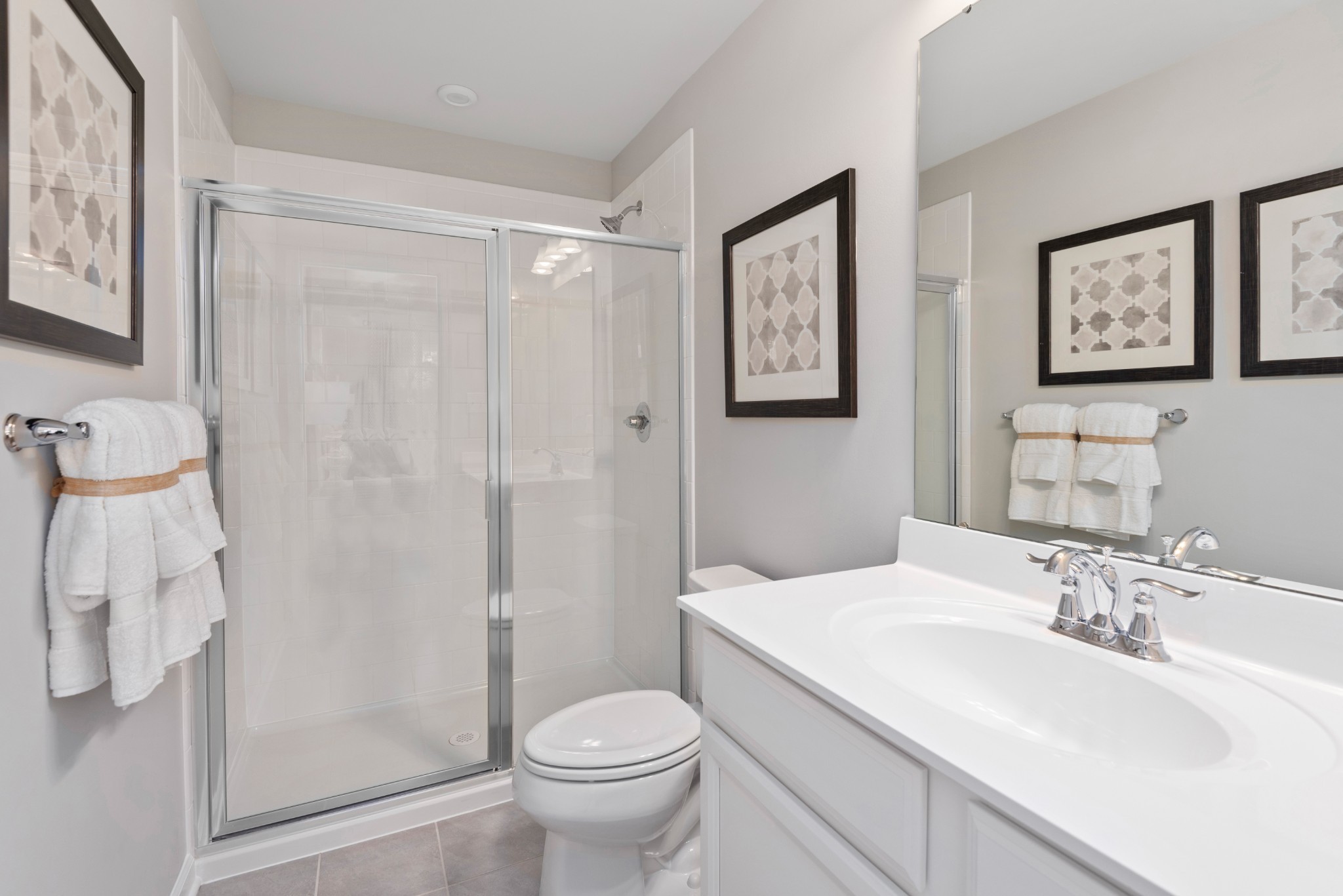 161 Keelon Gap Road, Unit 132A Spring Hill, TN 37174 - Photo 8 of 12 a bathroom with a sink toilet and shower
