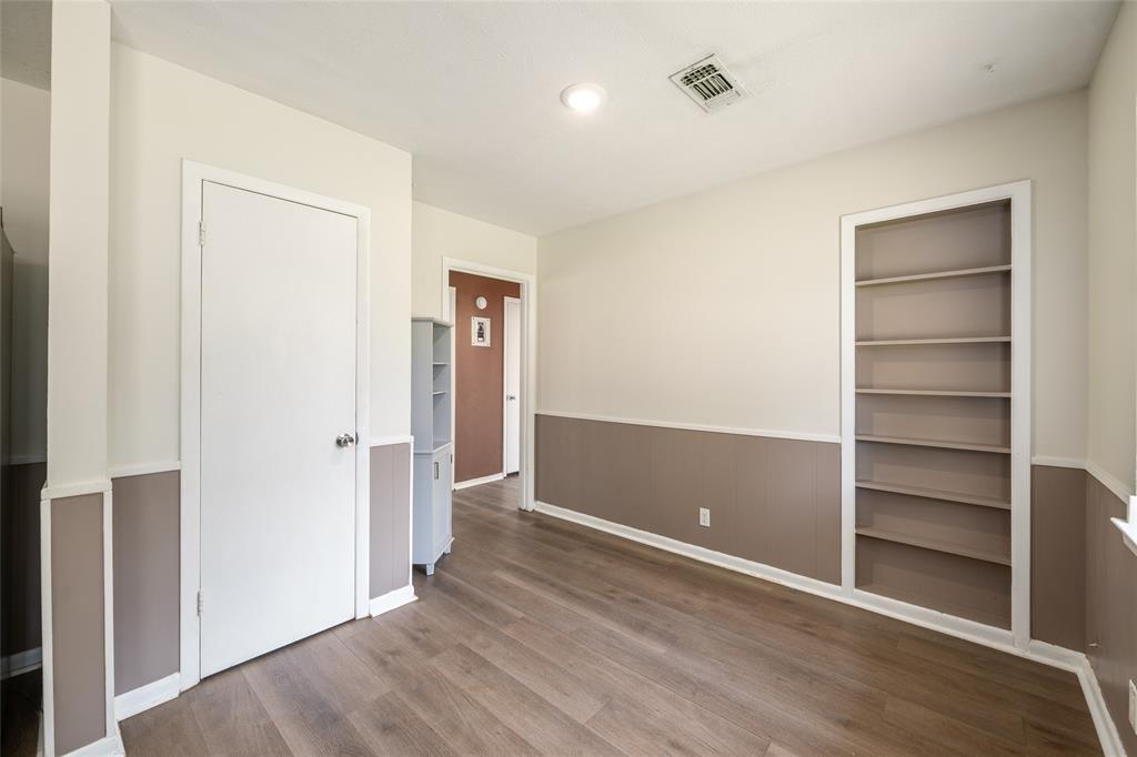 604 Pershing Drive Denton, TX 76209 - Photo 19 of 24 a view of an empty room with closet and a window