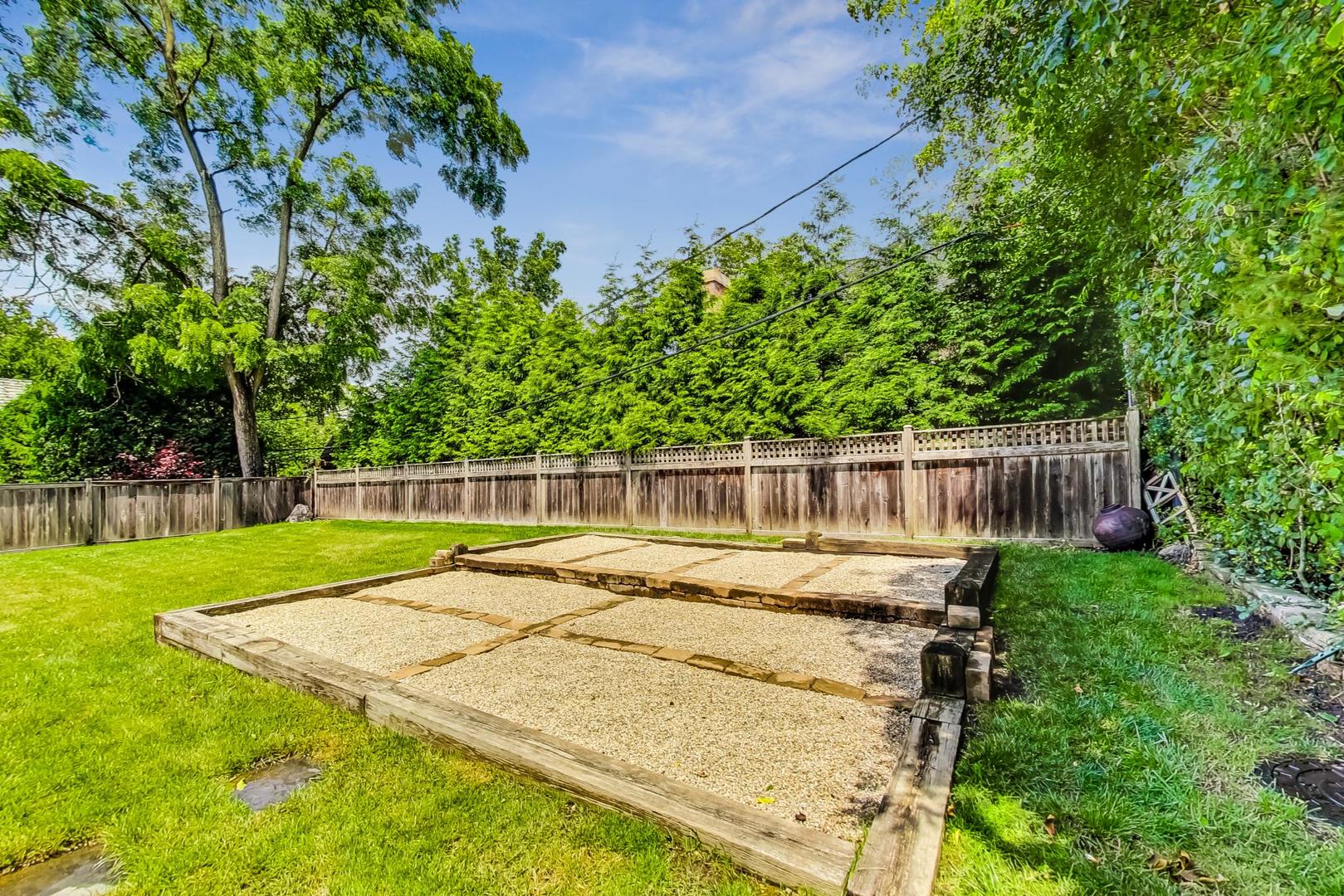 929 Valley Road Glencoe, IL 60022 - Photo 42 of 46 a view of a backyard with small cabin