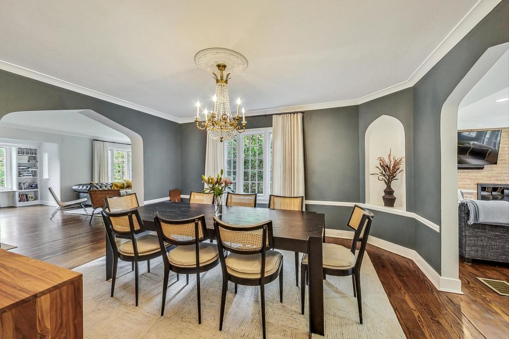 929 Valley Road Glencoe, IL 60022 - Photo 9 of 46 a view of a dining room with furniture and wooden floor