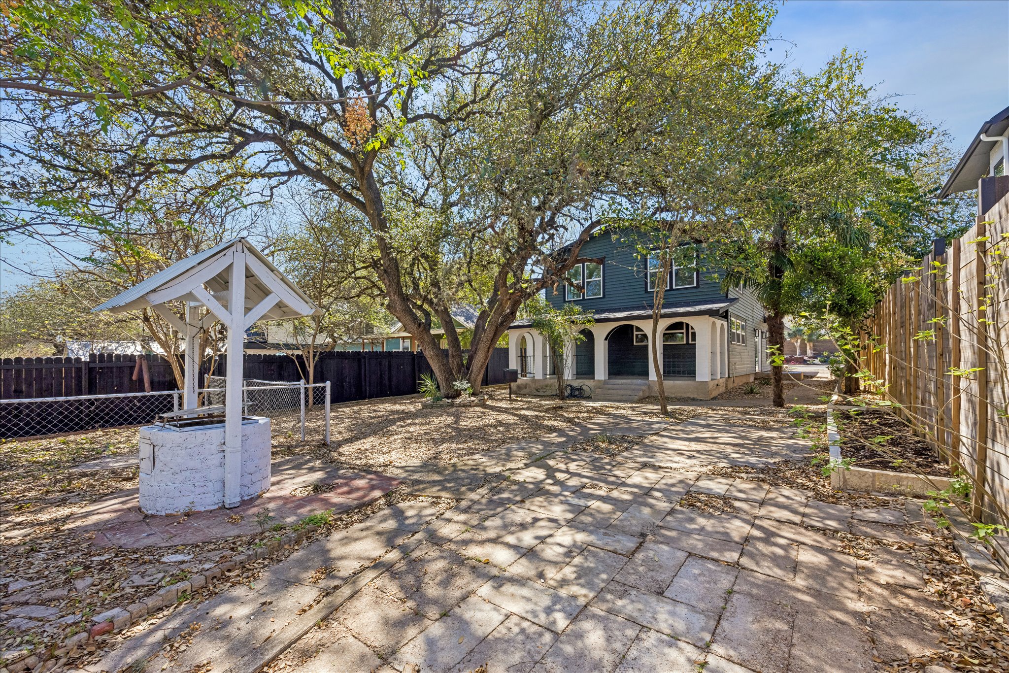 808 West Elizabeth Street Austin, TX 78704 - Photo 20 of 20 Back of house featuring a fenced backyard and a patio