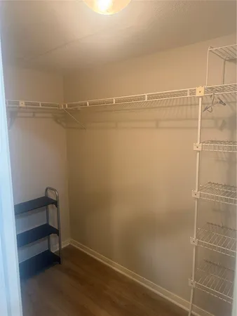 a view of a room with racks on the wall