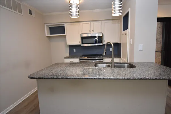 a view of kitchen island of the kitchen