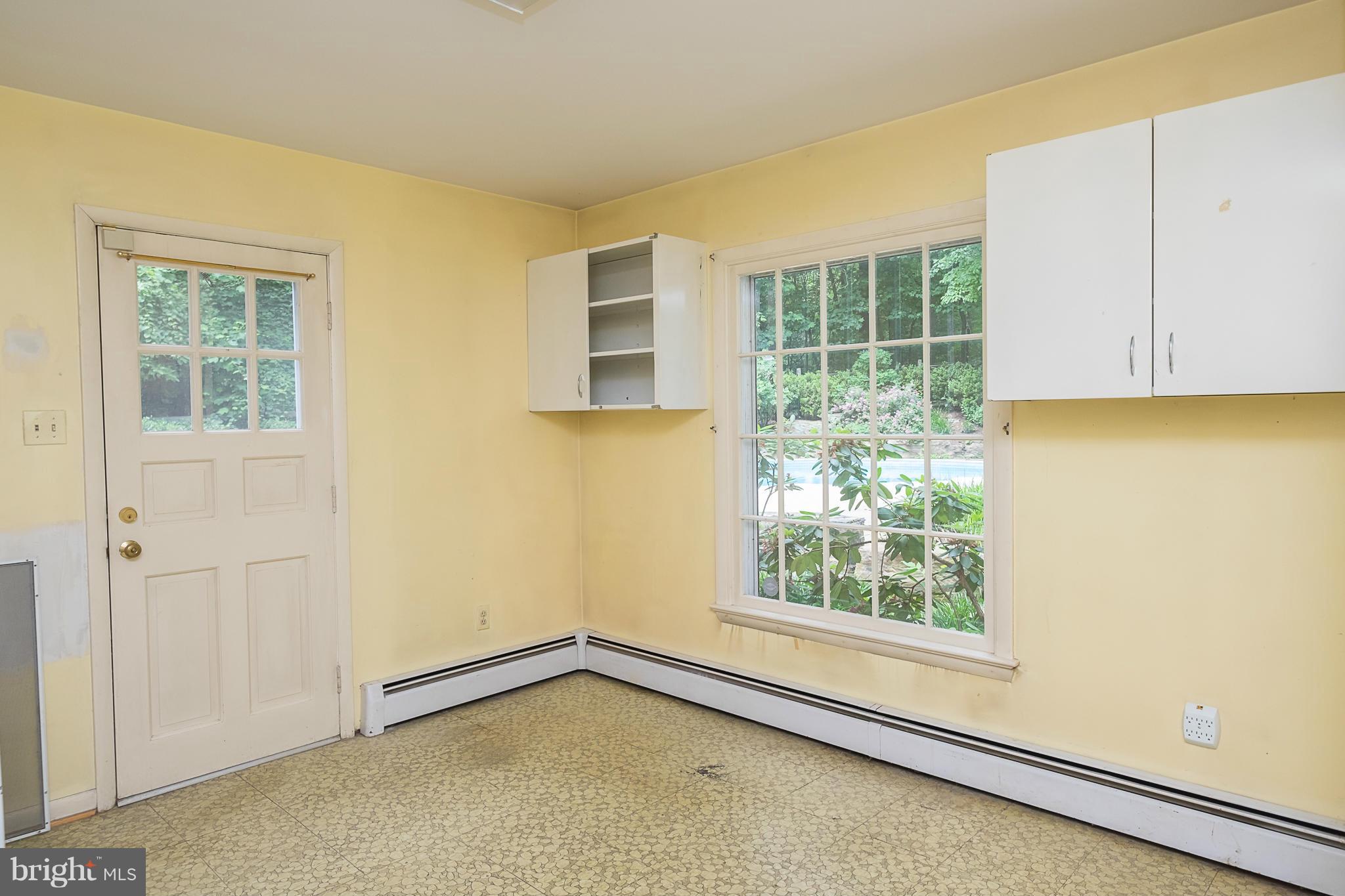 10836 Harding Road Laurel, MD 20723 - Photo 11 of 25 an empty room with a window
