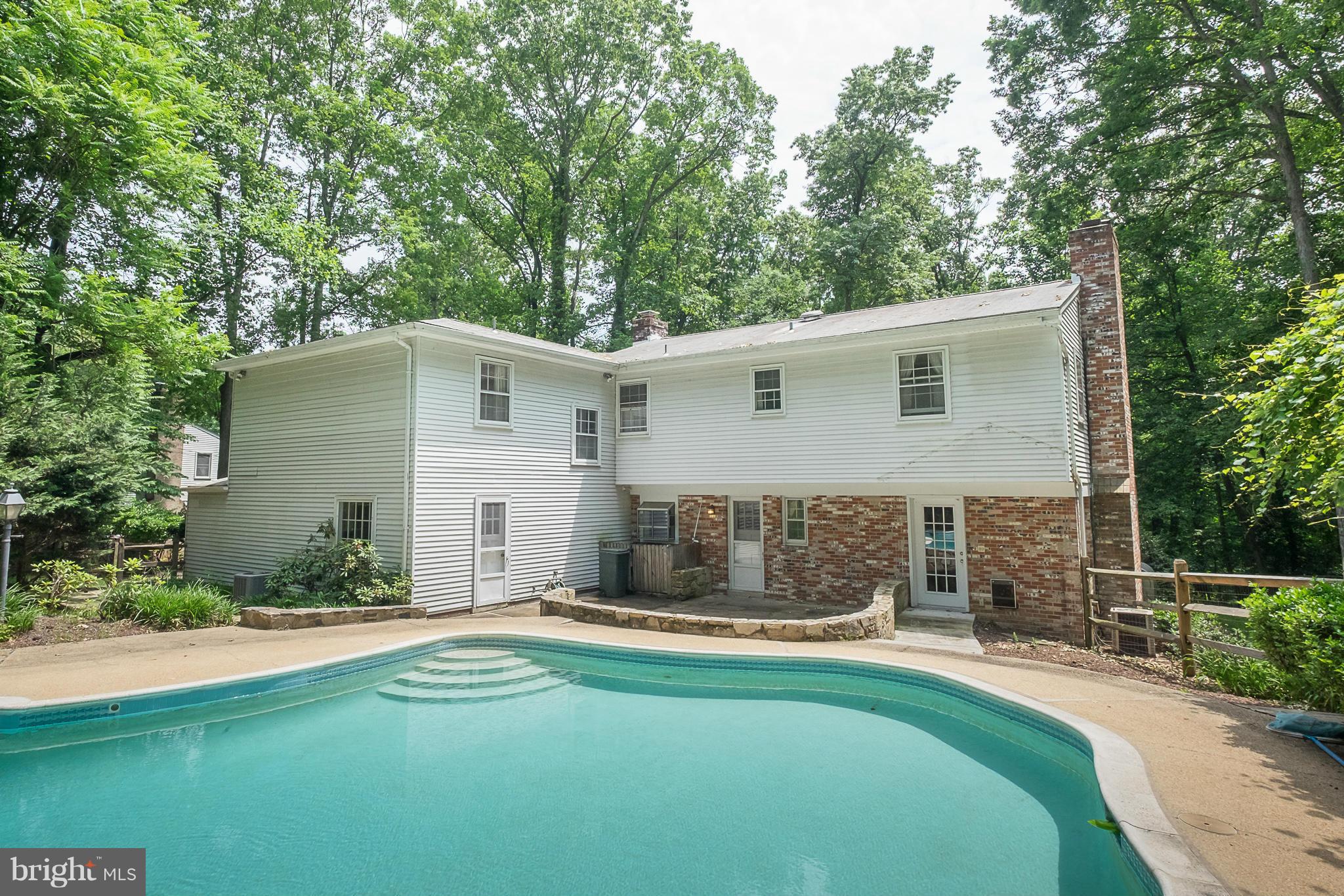 10836 Harding Road Laurel, MD 20723 - Photo 24 of 25 a front view of a house with a yard